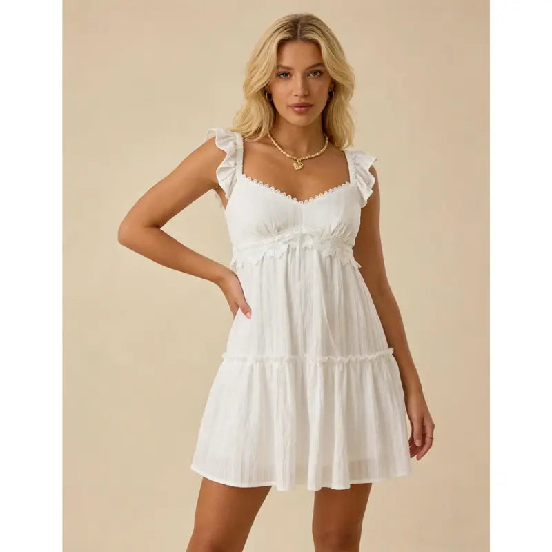 Women Ruffle Spaghetti Strap Mini Sundress, V Neck Lace Trim Empire Waist Self Tie Front Tiered Flowy Babydoll Dress, Smocked Back Sleeveless Light Textured Fabric Short Swing Dress, Cute Casual Summer Outfit for Beach Vacation